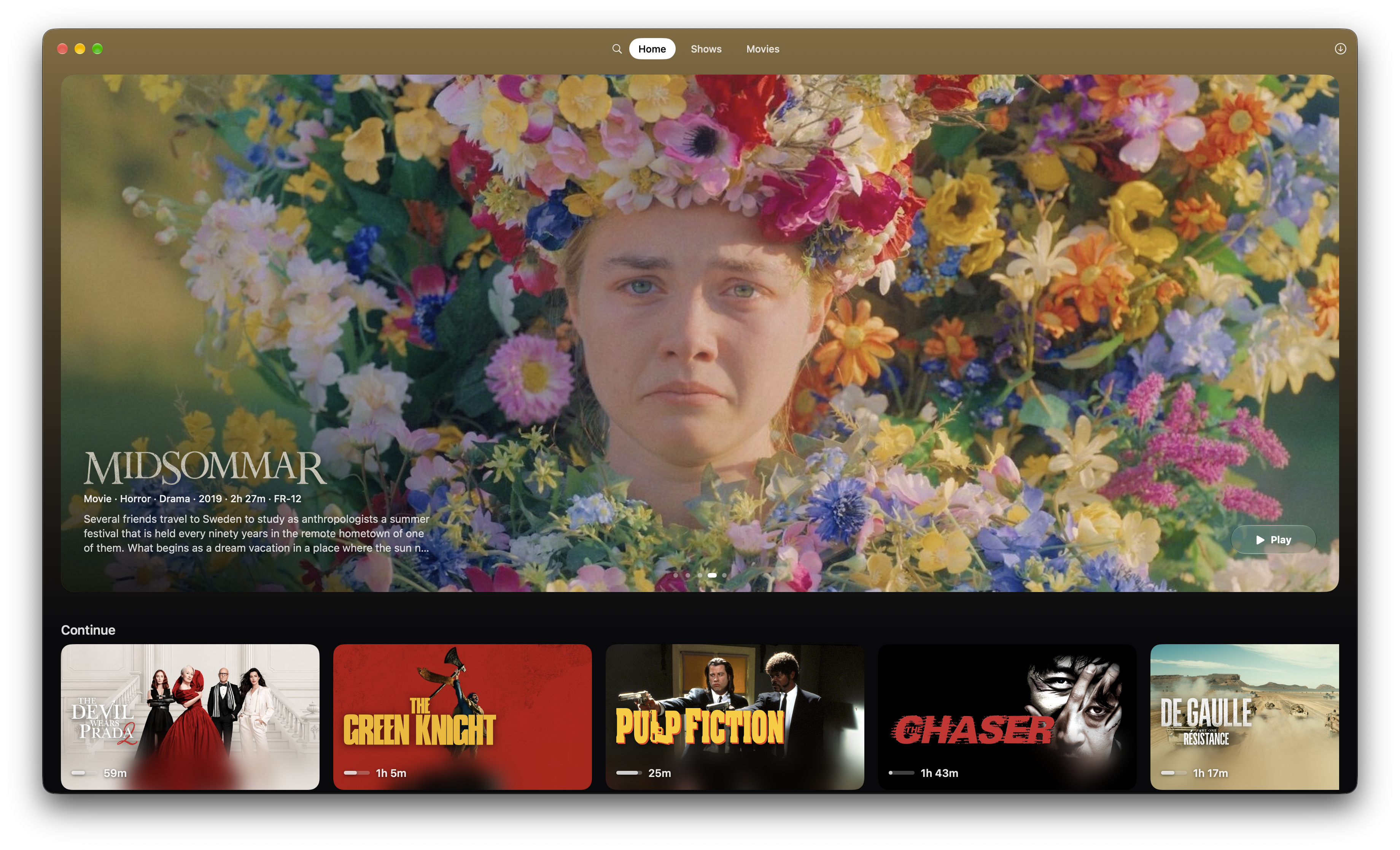 Theatre home screen with featured movies and Continue watching.